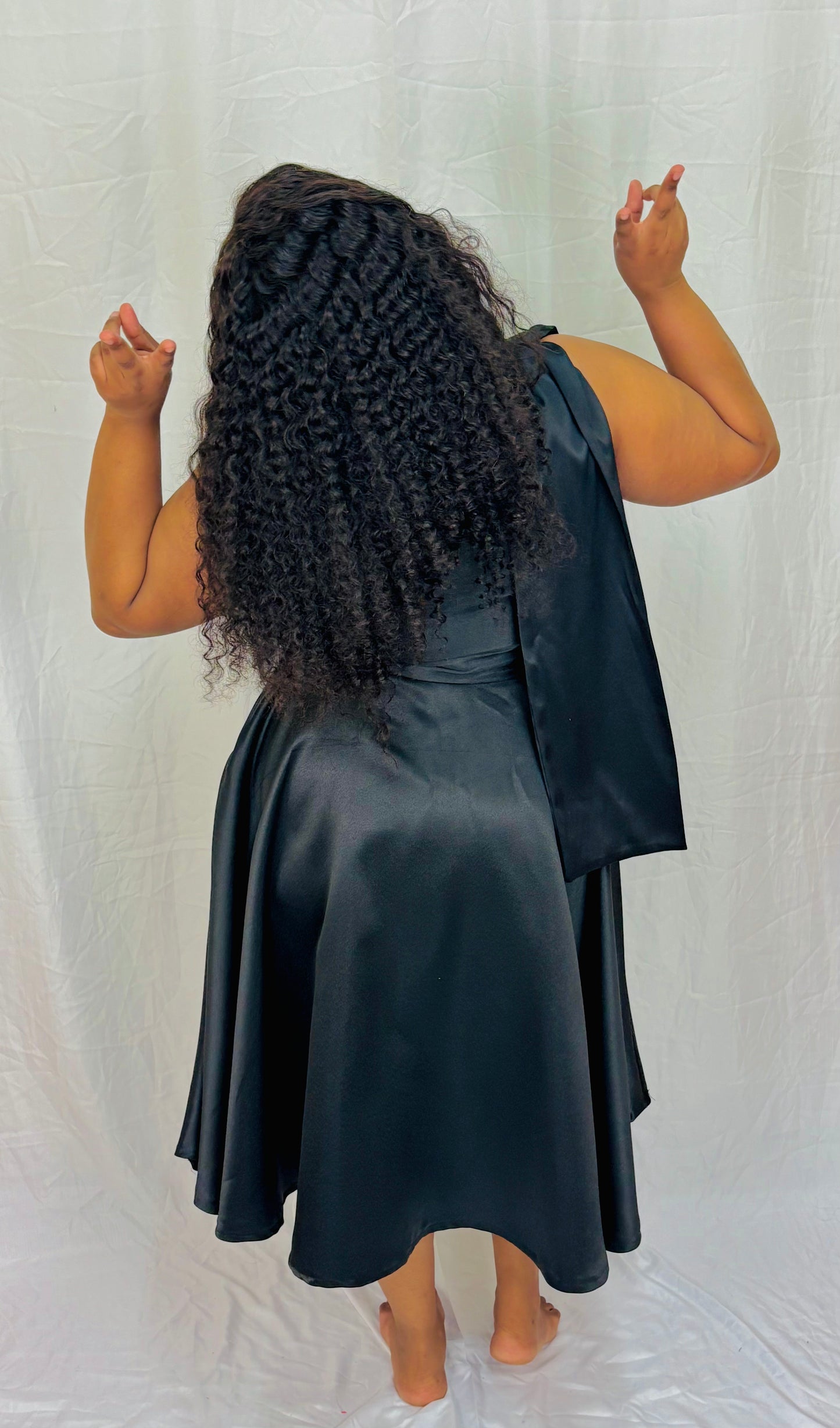 Asymmetrical neckline black dress